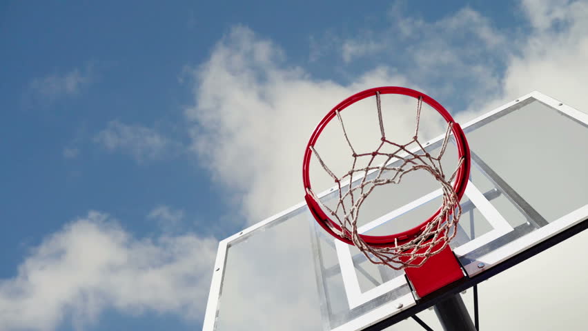 Basketball Hoop With Cage With Clouds Time Lapse Footage In Background ...