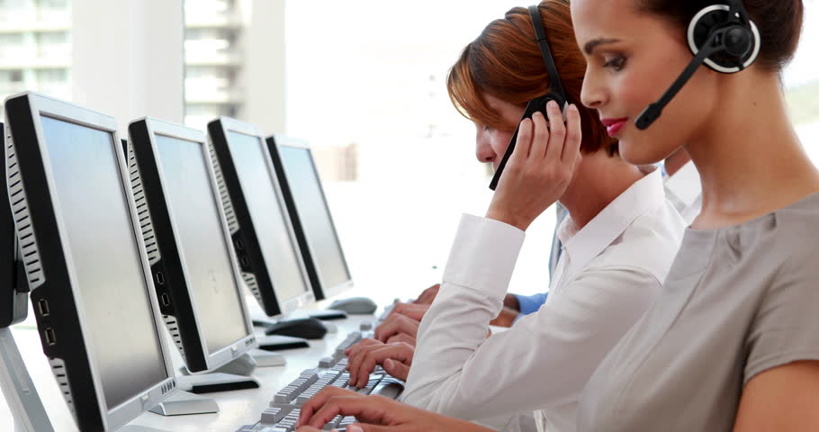 Happy Call Center Employees At Work In The Office Stock Fooe 6868444 Shutterstock Happy Call Center Employees At Work In The Office Stock Fooe