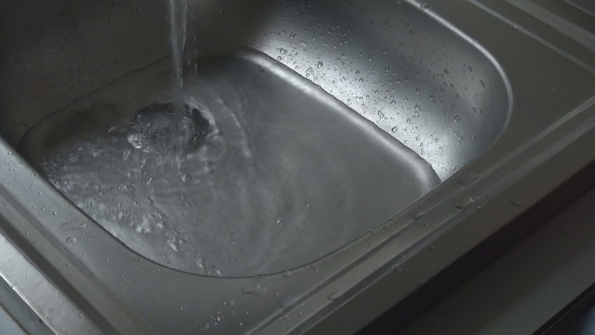 Hd00 19water Flowing In Kitchen Sink Hand Stop The Flow Water Drain