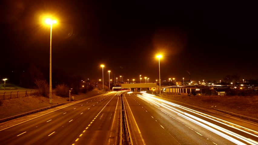 Fast Motion Shot Of Traffic Moving On Street At Night, New Delhi, India ...