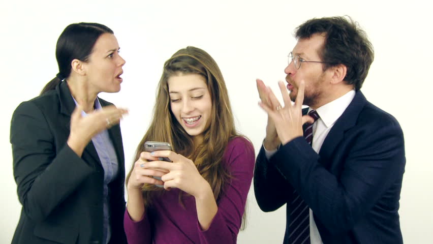 Two Angry Parents Fighting While Teenager Daughter Is Playing With Cell ...